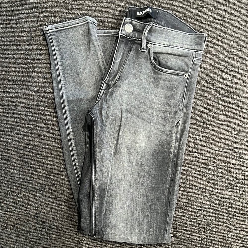 Gray Express Jeans with ripped knee